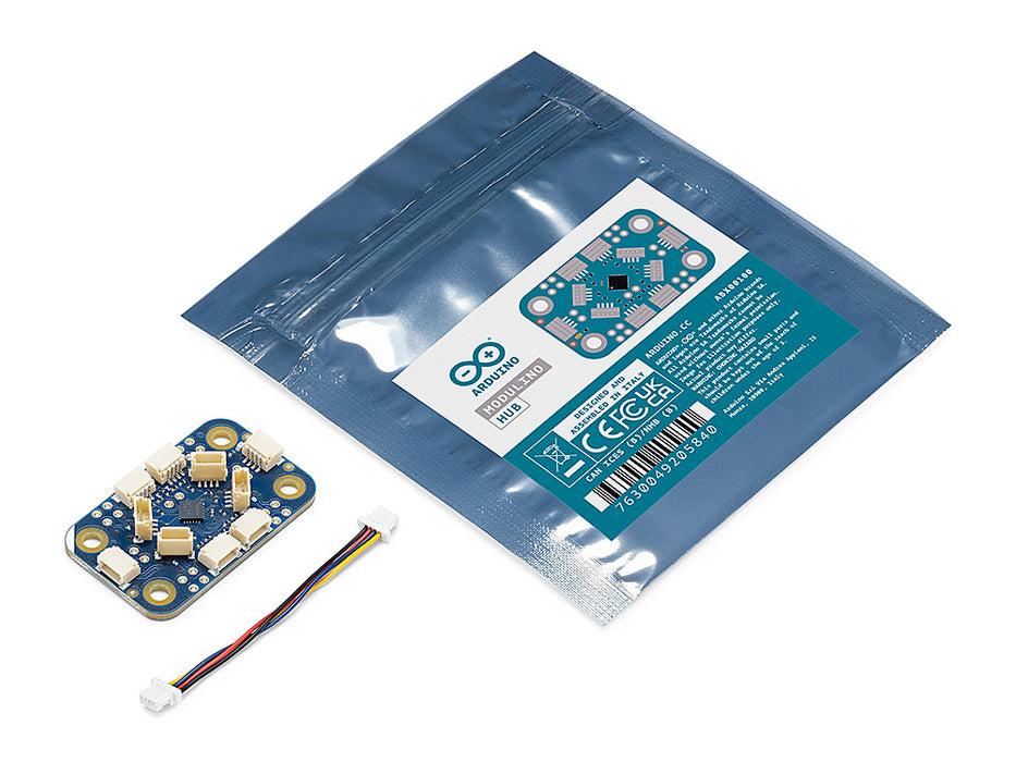 Unboxed Arduino Modulino Hub resting beside its protective anti-static packaging bag, demonstrating the compact size of the I2C expansion module.