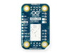 Bottom view of the Arduino Modulino Motors printed circuit board (PCB), displaying the official Arduino branding, white silkscreen details, and metal solder pads.