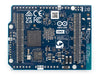 Back view of the Arduino UNO Q board. Clearly shows the Qualcomm Dragonwing processor and regulatory markings.