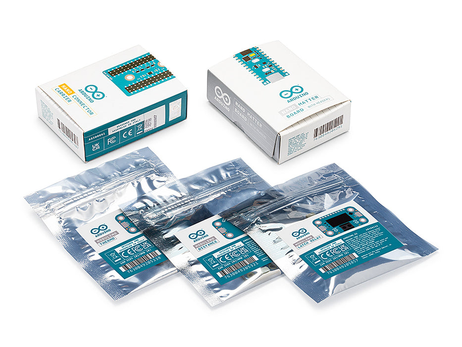 Individual retail packaging for the Arduino Matter Discovery Bundle, showing the Nano Matter and Nano Connector Carrier boxes next to three Modulino sensor pouches.