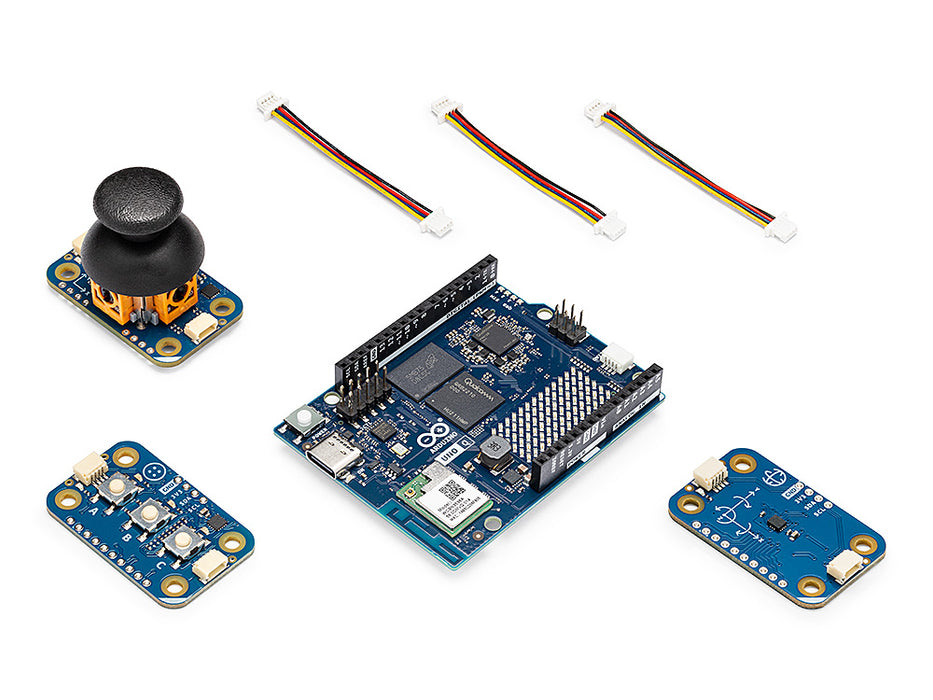 Arduino UNO Q Arcade Bundle components laid out on a white background, featuring the central UNO Q microcontroller board, a mini thumb joystick module, a triple push-button module, an IMU sensor board, and three 4-pin JST connecting cables.