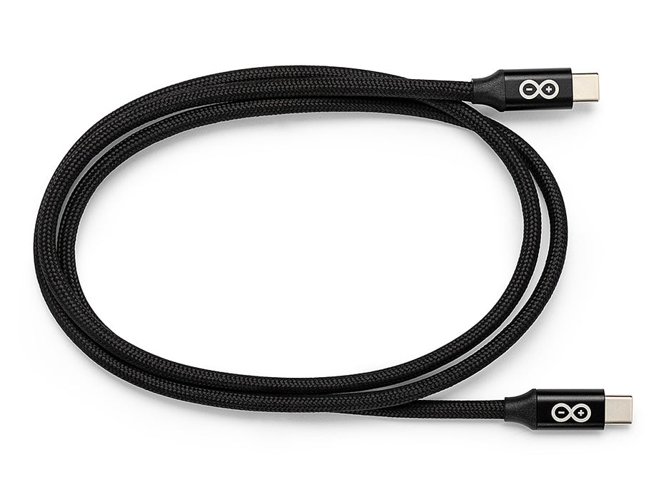 Top-down view of a coiled 1-meter Arduino USB-C cable with durable black braided sleeve and official Arduino logo on the connectors.