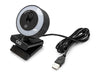 Angled view of the Arduino USB Camera on its folding monitor clip, showing the illuminated LED ring light, sliding privacy shutter, and coiled USB-A cable.