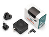 Components of the Arduino 65W USB-C power supply accessory kit, including the power brick, interchangeable US, UK, and EU plugs, and a DC jack adapter, spread out next to its retail box.