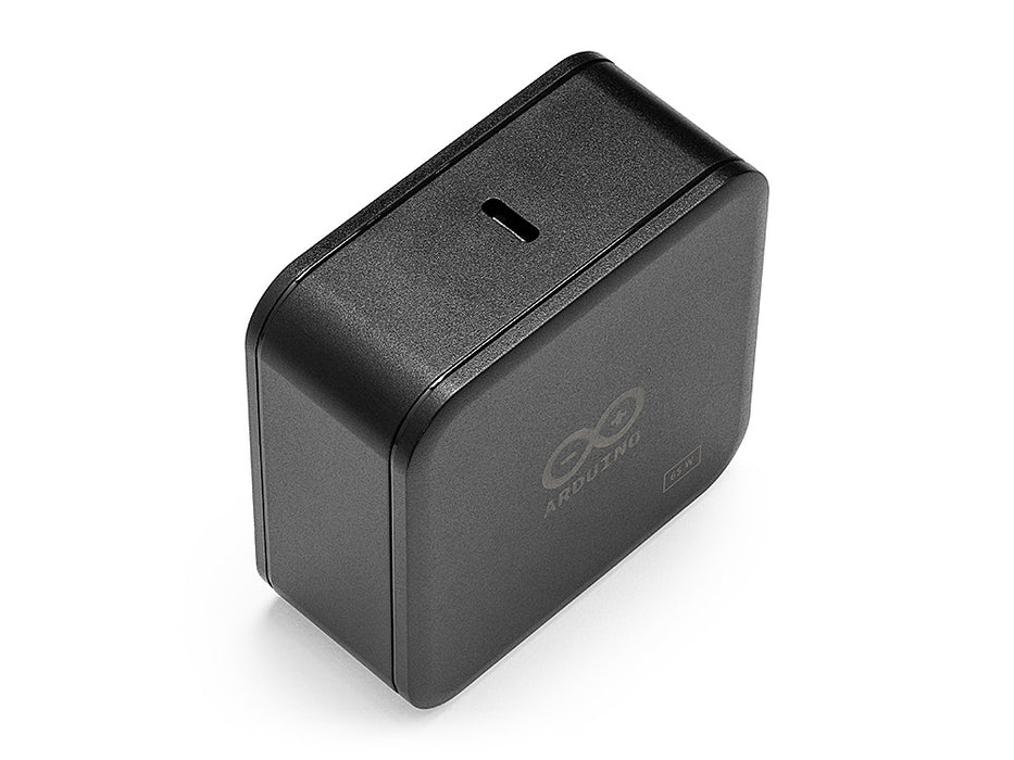 Angle view of the black Arduino power adapter body showing the single USB-C charging port on the top and the folded power plug on the side.