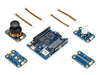 Isometric layout of the Arduino UNO Q SBC controller bundle, showing the main board with Modulino joystick, knob, buttons, and distance modules.